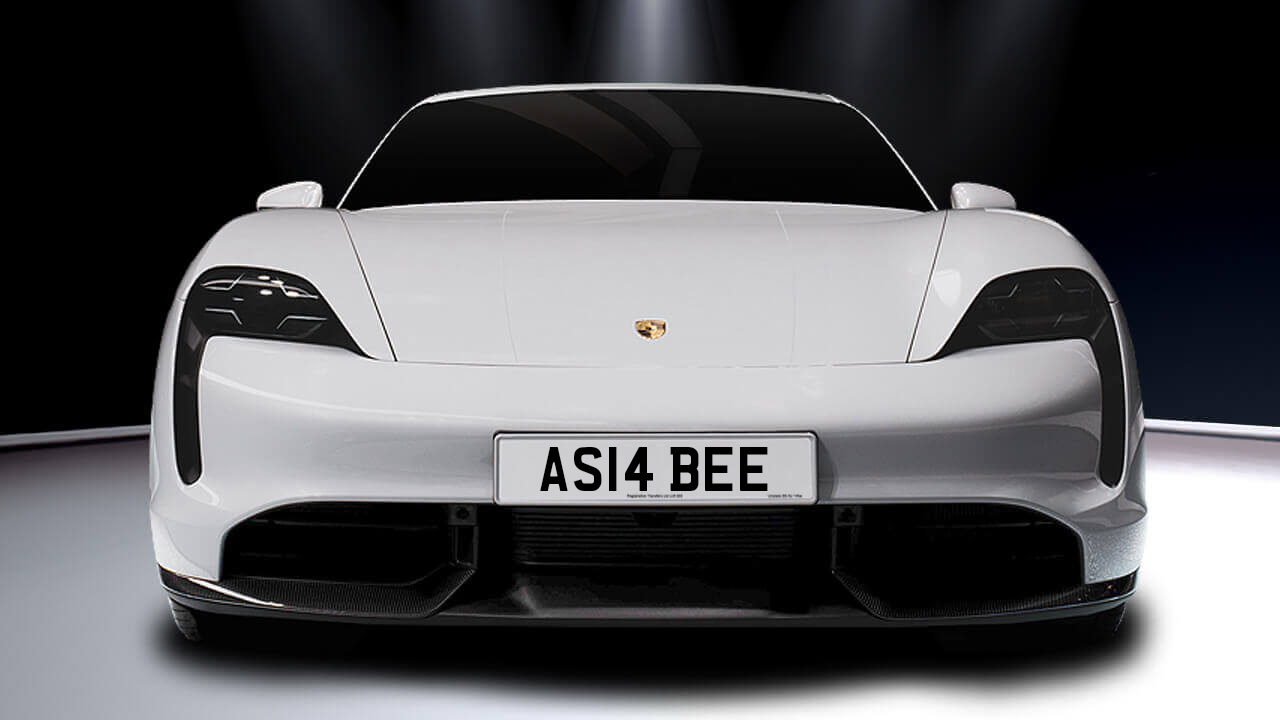 Car displaying the registration mark AS14 BEE